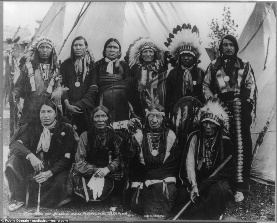Ten Native American chiefs are pictured wearing native clothing, at the St. Louis Exposition, in 1904