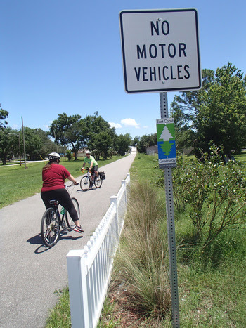 East Coast Greenway riders crossing the Garden Street Bridge in Titusville by 