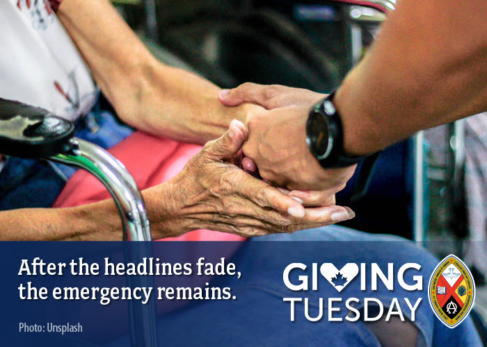 Giving Tuesday: After the headlines fade the emergency remains. Hands holding.