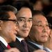 Samsung's restructuring is expected to increase the influence of Lee Jae-yong, center, the son of conglomerate's chairman, Lee Kun-hee, who has been incapacitated by a heart attack.