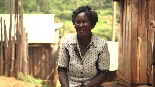 Photo of a smiling Margaret on a sunny day.