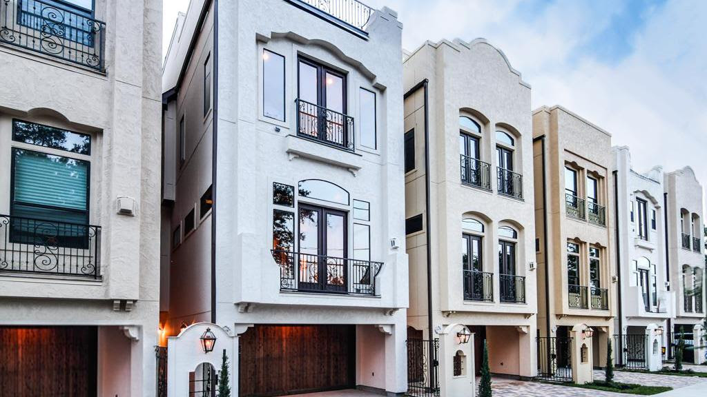 The second bedroom features two twin beds, a large closet. Aman Khan With Titan Homes Shares Three Design Trends In Houston S Townhome Market Houston Business Journal