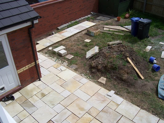 For decorative paving slabs we've got a range of reengineered and natural stone patio slabs to create outdoor spaces with. Patio Slabs And Turf Laid Mr Parker Builders Lincolnshire