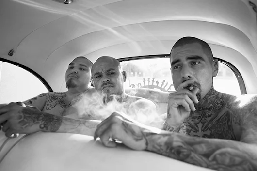 From behind bars to behind the needle: Portraits of Mexican criminals turned tattoo artists.
