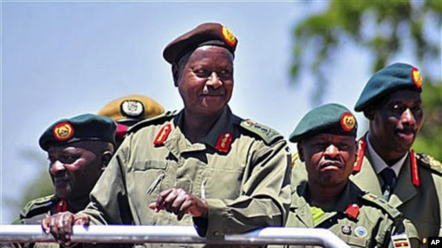 Uganda's President Yoweri Museveni inspects an guard of honor at Soroti, Uganda, during celebrations to mark 30 years of The Uganda Peoples Defence Force, previously the National Resistance Army, February 6, 2011