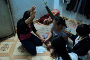 A group of women praying.
