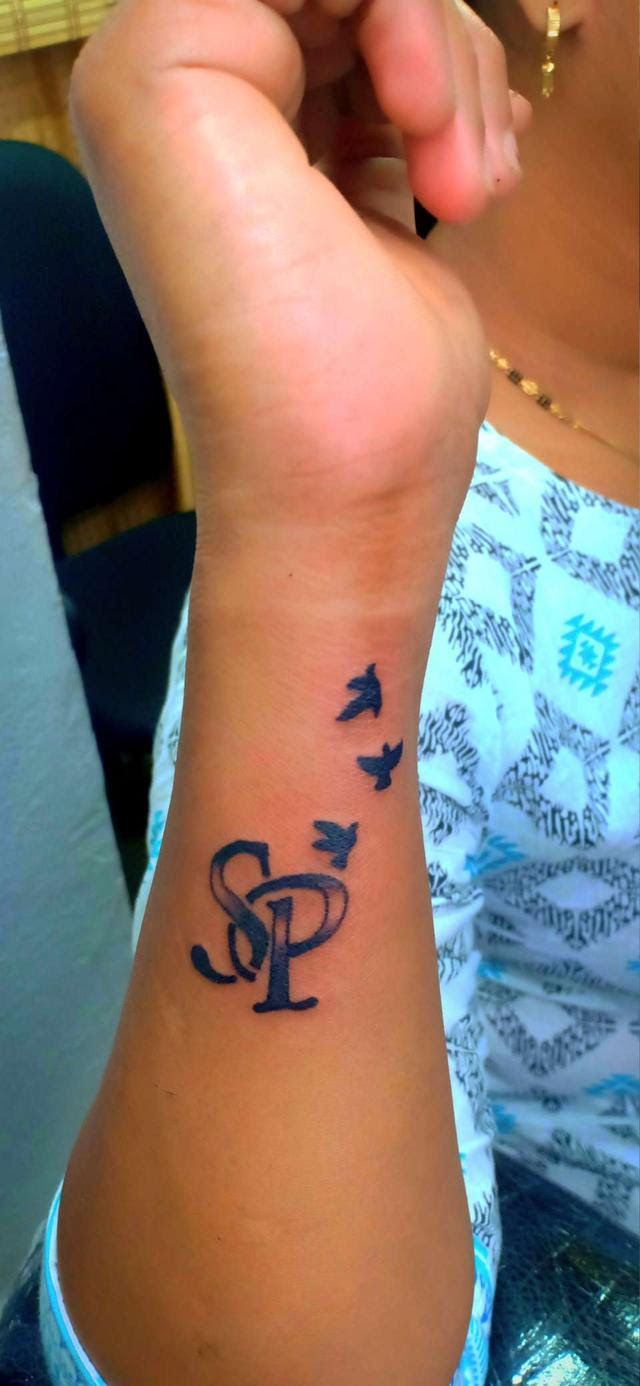S P Name Tattoo Design