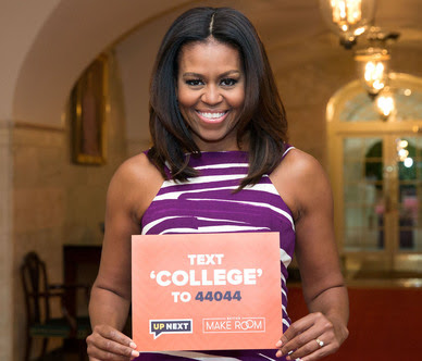 First Lady Holding Sign Promoting Up Next