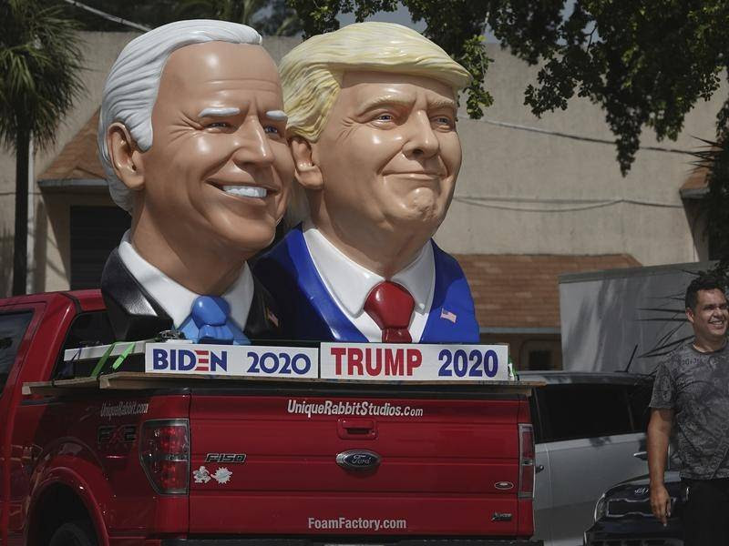 Trump and Biden scultures