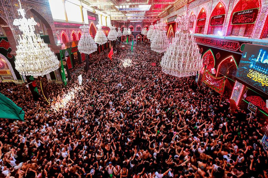 Shiite Muslim worshippers inside the shrine of Imam Hussein.