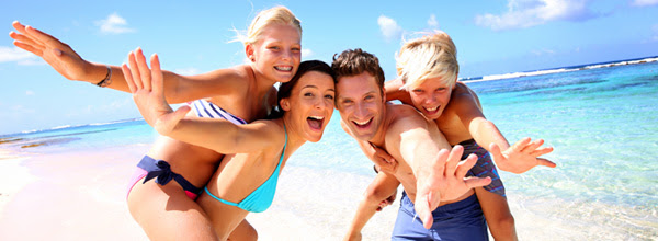 Family having fun at the beach