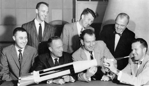 The original seven astronauts pose with an Atlas model July 12, 1962. The "en:Mercury Seven" astronauts pose with an Atlas model on July 12, 1962. Front row, left to right: Gus Grissom, Scott Carpenter, Deke Slayton and Gordon Cooper. Back row: Alan Shepard, Wally Schirra and John Glenn. Credit: NASA