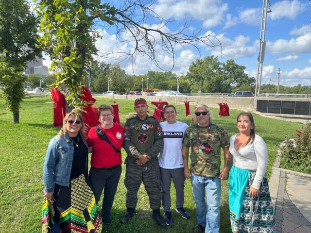 Indigenous Ministries youth program participant Will Miller (third from right) and Prairie-to-Pine/Living Skies/Northern Spirit Executive Minister Shannon McCarthy (second from left) meet with representatives from Camp Morgan and Camp Marcedes.