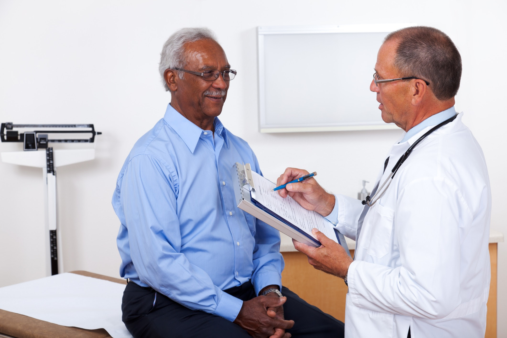 Man discussing health with his doctor