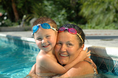 grandma and grandson swimming