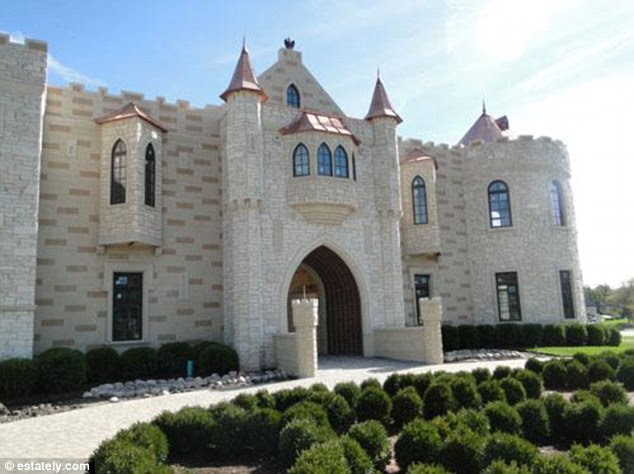 Chicagoland: This five-bedroom palace featuring 18-inch thick walls, an elevator and 12 skylights is located just outside Chicago in Oak Brook, Illinois, while listed for $4,499,000