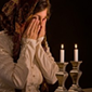 Why Do We Wave and Cover Our Eyes When Lighting Shabbat Candles?