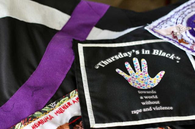 Thursday's in Black handprint knitted blanket