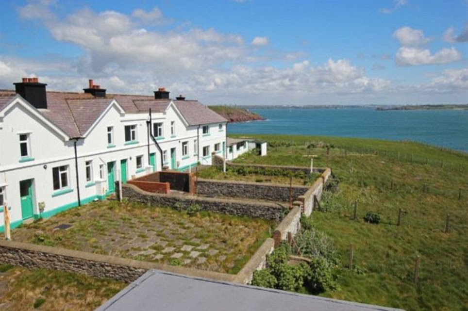 Amazing sea view: The row of cottages which are also available for sale individually. They are all in a poor state of repair