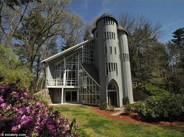 Emerald palace: This four-bedroom in Lincoln, Massachusetts features a study and a library as well as an extra apartment for a live-in nanny while listed for $1,295,000