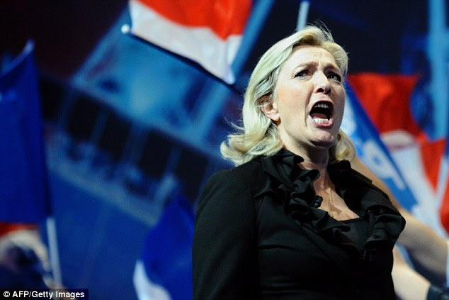 Marine Le Pen says schools in towns run by her National Front party will stop serving non-pork alternatives to Muslim children