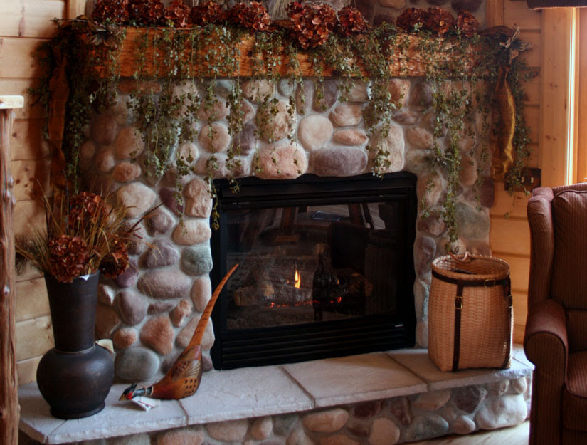 In this case the stone veneer work must be done on the chase before the metal roof goes on. Northwoods River Rock Manufactured Stone For Walls Cast Natural Stone Veneer