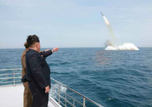 Kim Jong Un observes missile launch / KCNA