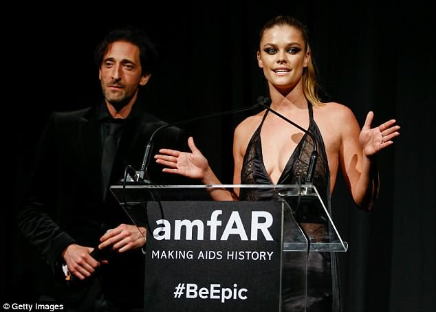 Speaking out: Nina Agdal se juntou a Adrien no palco durante a gala