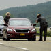 New York State Police troopers inspected cars along Route 86 near Friendship, N.Y., on Saturday. Two men matching the descriptions of the prison escapees, David Sweat and Richard W. Matt, had been spotted in the area, the police said.