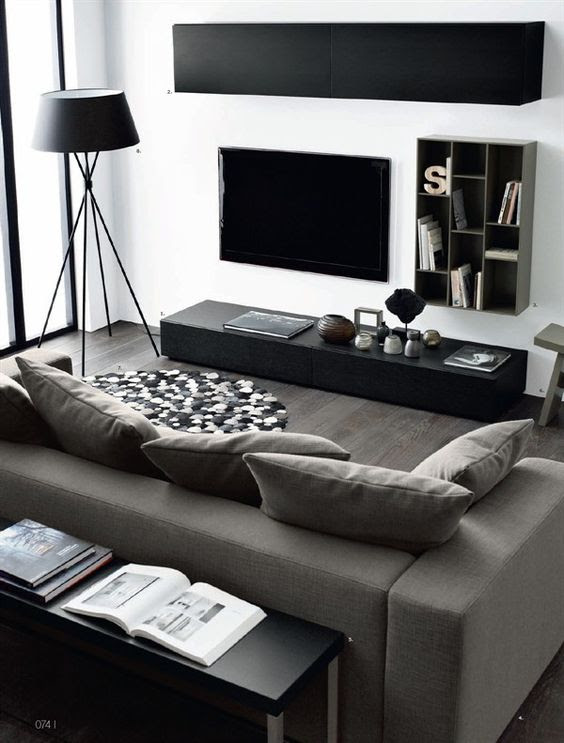 This luxurious black and white modern living room a black sofa table placed behind a white sectional topped with white pillows and paired with a round marble top coffee table. 48 Black And White Living Room Ideas Designs Decoholic
