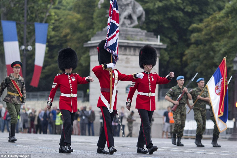 Three British soliders were among the 76 nations who took part in today's Bastille Day parade celebrations marking the anniversary of the storming of the Paris prison