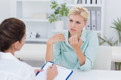 Patient discussing diagnosis with doctor