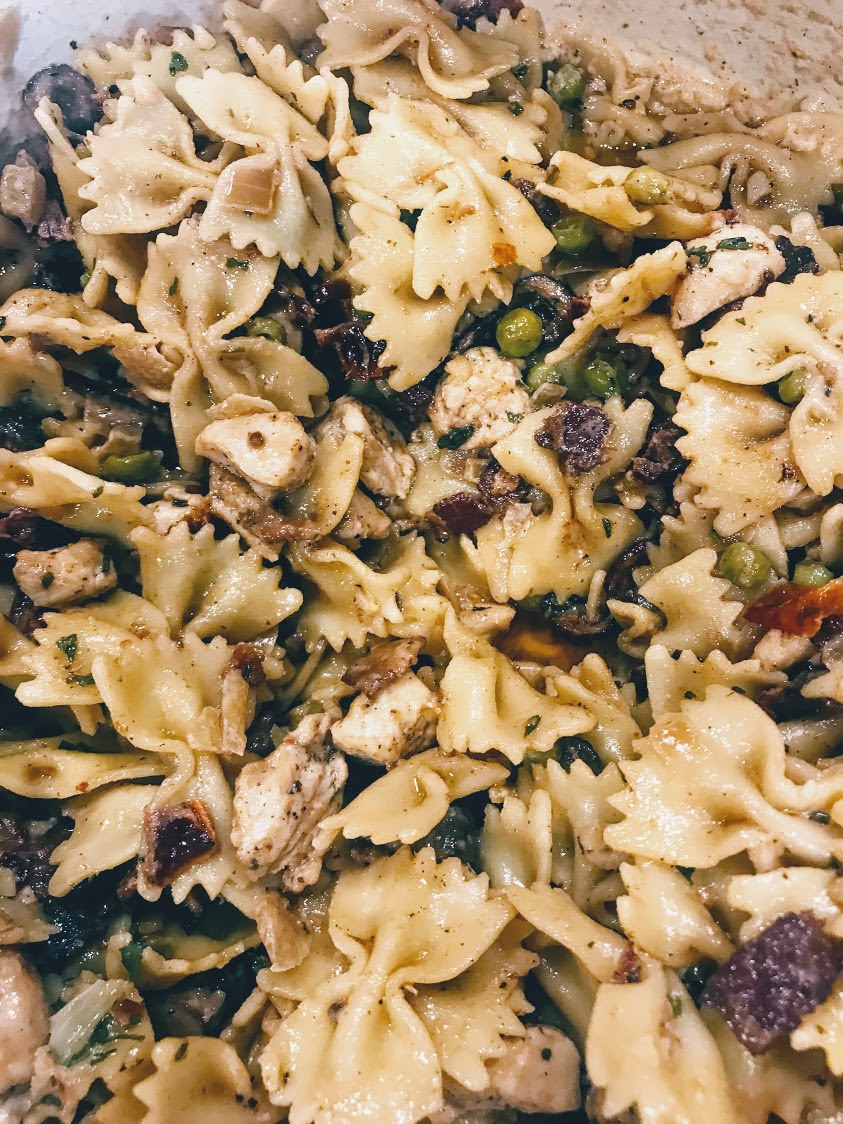 Add the roasted garlic paste to the cream sauce along with the reserved pan drippings from the roasted chicken and whisk to incorporate well. Year Of Disney Lady And The Tramp With Cheesecake Factory S Farfalle With Chicken And Roasted Garlic Sauce