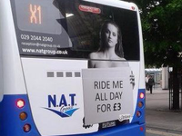 Welsh bus company pulls 'Ride me all day' topless photo ads after it's accused of sexism