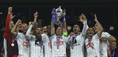 Toulouse players celebrate with the trophy after winning the French Cup final soccer match between Nantes and Toulouse, at the Stade de France in Saint-Denis, outside Paris, Saturday, April 29, 2023. Toulouse won the match 5-1. (AP Photo/Aurelien Morissard)/TH146/23119765917636//2304292320