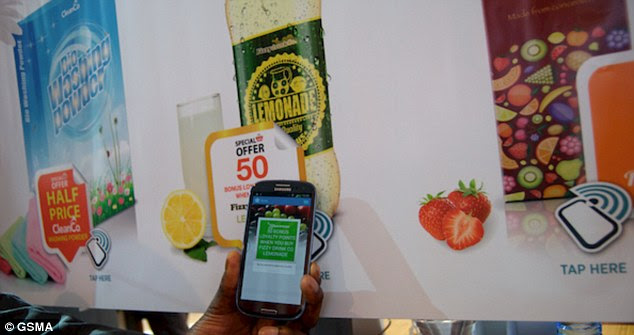 In a mock-up shop in the Connected City, pictured, photos of products were placed on posters with NFC tags. Users could then hold their phones up to the tags to add those items to a shopping basket. They could then pay for their shopping and send their order to a warehouse for collection