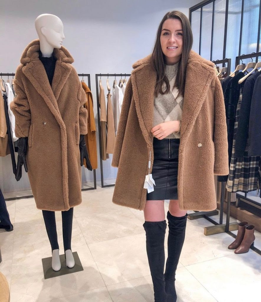 Oversized camel coat with a silk base, lapel collar, dropped sleeves and vertical welt pockets. Max Mara Teddy Coat Past Present Future Chani Lillian