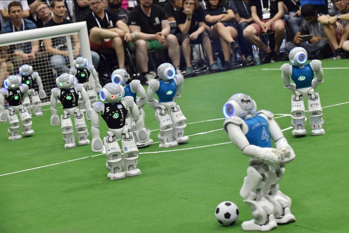 Photo of robotic soccer players.
