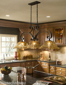 The style as a whole plays with vintage elements while still feeling clean, intentional, and warm. French Country Island Light Fixture Feed Kitchens