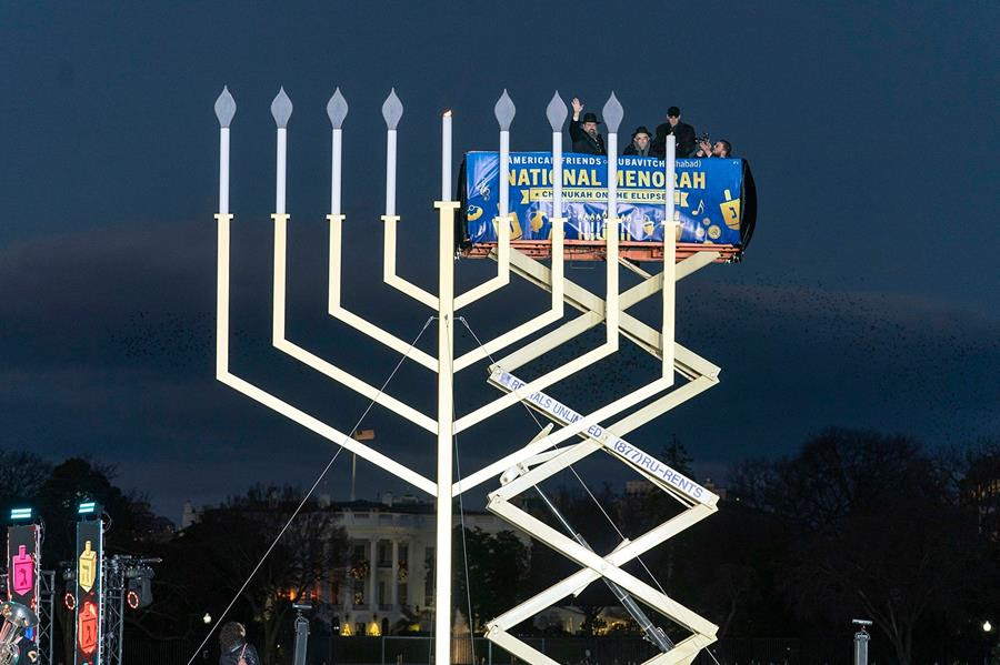 Rabbi Levi Shemtov, Rabbi Abraham Shemtov and Attorney General Merrick Garland participate in the annual National Menorah Lighting in celebration of Hanukkah, on the Ellipse near the White House.