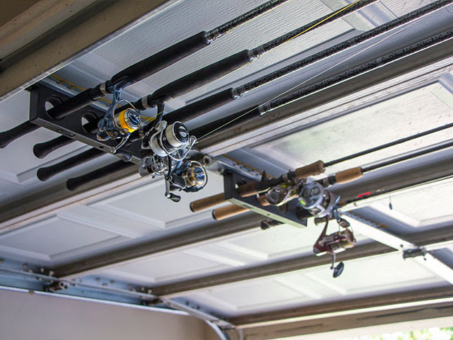 There are three overhead doors: Hanging Fishing Rods In Garage Pasteurinstituteindia Com