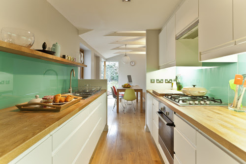 A galley kitchen has two walls with an aisle between them. 10 Tips For Planning A Galley Kitchen