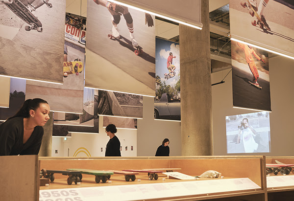 Visitors inside the Skateboard exhibition space