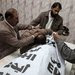 Mourning at a hospital morgue in Quetta, Pakistan, for one of four anti-polio workers who were killed by gunmen on Wednesday.