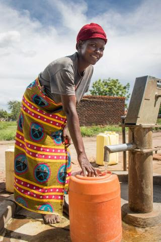 Woman filling water