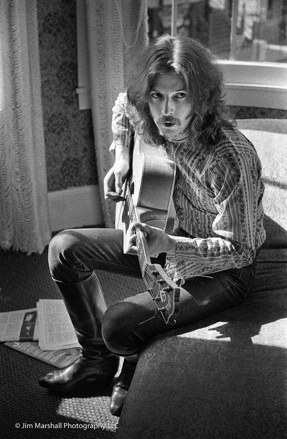 The close relationship and incredible access Jim Marshall had to musicians of the era - and down through the years - is evidenced by this picture of Eric Clapton playing guitar in the photographer's apartment on Union Street in August 1967