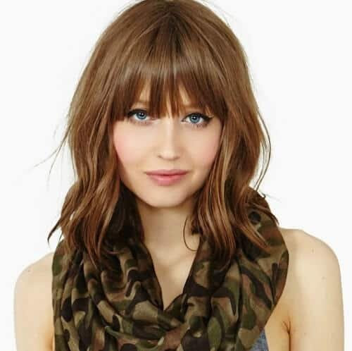 If you have long but thin bangs in front then try this one of the super sexy ponytails with bangs. Bring Movement Flexibility 50 Haircuts With Bangs For Medium Hair Hair Motive