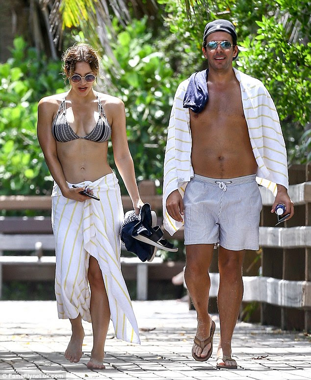 Bikini-clad Katharine McPhee shows off her incredible beach body as she goes for a swim in Miami