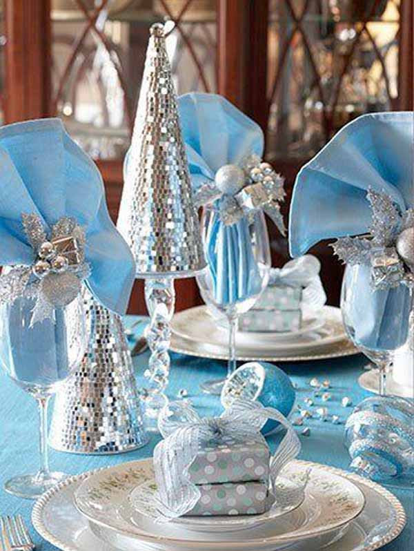 After cutting each piece of ribbon, place it around the napkin. Blue Christmas Decorations Christmas Celebration All About Christmas