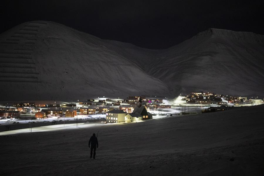 Svalbard Kirke member Lars-Olav Tunheim descends from Plataberget mountain during a hike in Longyearbyen, Norway.